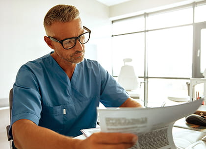 Visual of healthcare professional reviewing  document